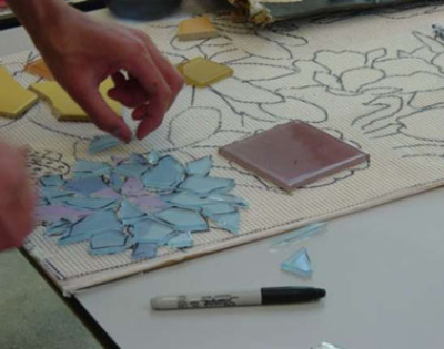 Connie Glover: Making a Community Mosaic 8 meshed glass tiles over tracing paper