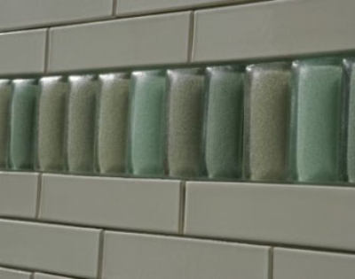 Slumped tiles used as a relief accent.